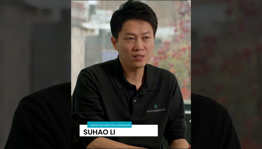 Laboratory Director Suhao Li presenting graphene application development innovation through GEIC strategic partnership for rapid prototype creation.